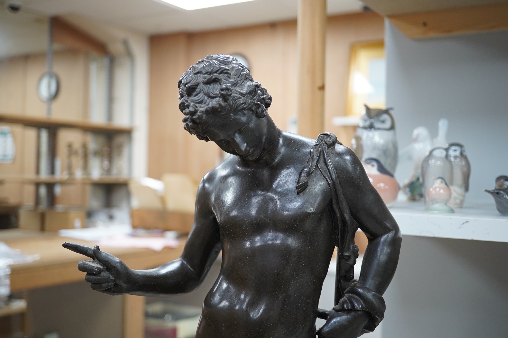 A bronzed resin figure, of Narcissus, 56cm high. Condition - good